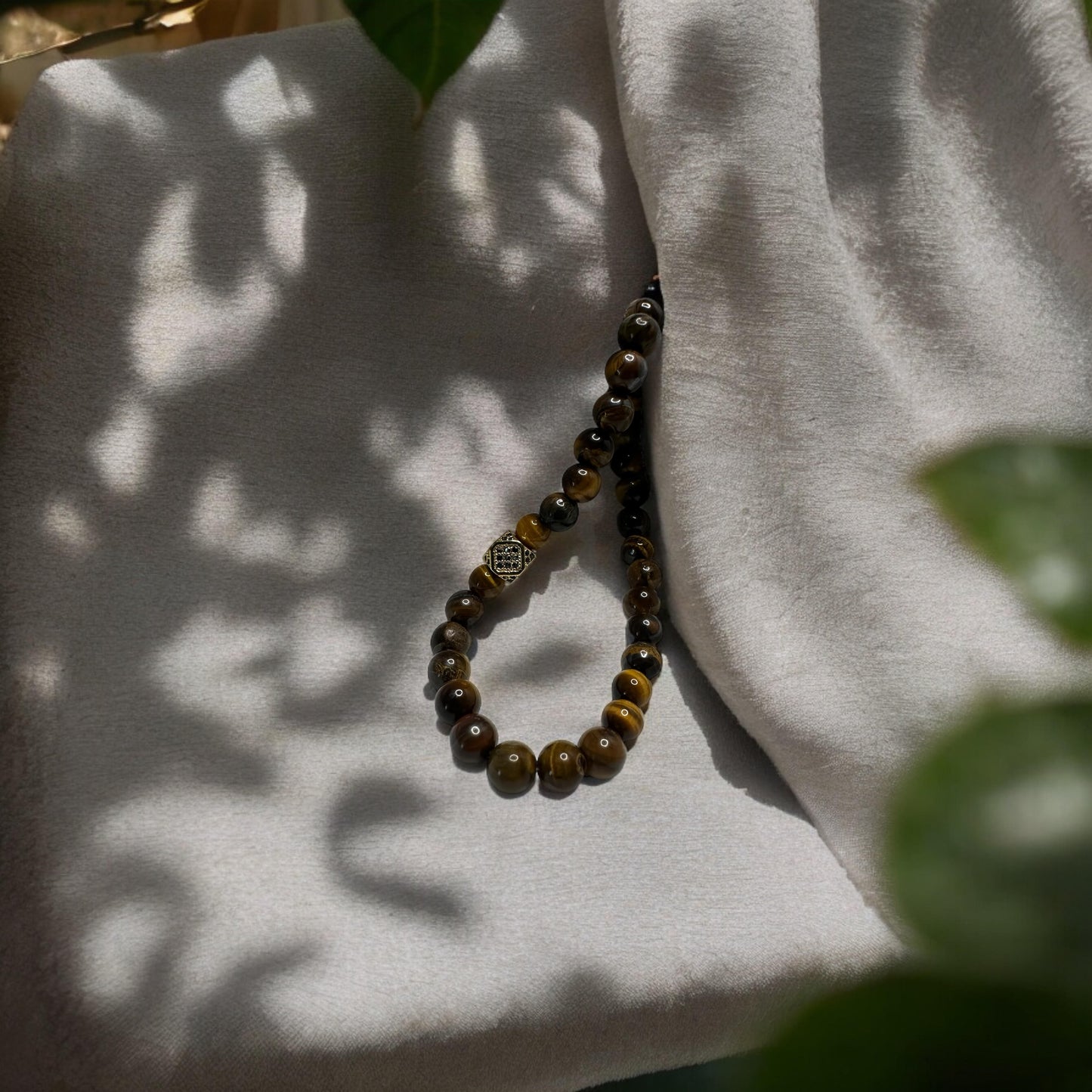 Tiger Eye with gold plated charm